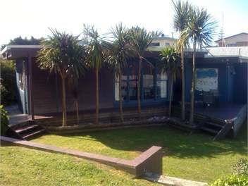 front of house with level child friendly yard
