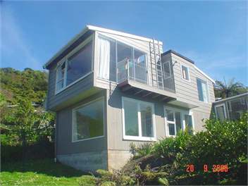 Looking up at house