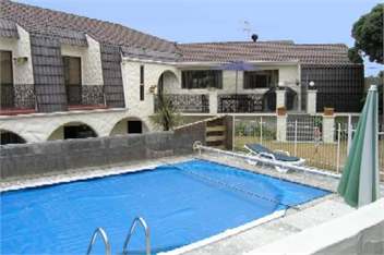 House overlooking private swimming pool