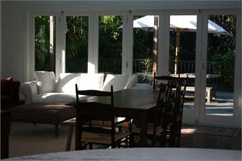 Family room looking out french doors onto deck-