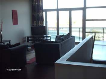 The upstairs open plan, kitchen, dining and lounge
