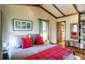 The bedroom, with ensuite bathroom
