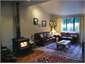Lounge with large Log Burner