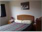 Main bedroom with ensuite toilet and basin