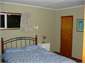Upstairs b/room- trundle bed here as well as queen