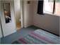 Main bedroom with ensuite toilet and basin