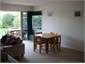 Dining area and doors to outside patio