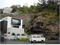 Location of 3 leveled Beach House above cliff .