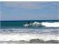 Surfing at Uriti