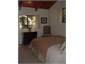 The charming guest bedroom