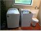 laundry with second toilet