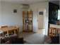 Dining to left, front door centre, kitchen right