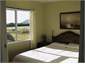Main bedroom (Queen bed) and view to hills.