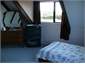 Upstairs 2nd bedroom.