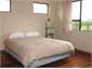 Queen bedroom, west side, evening sun