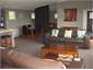 View of: Upstairs (TV room beyond dining table)