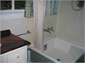 Bathroom with chub shower