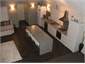 View of kitchen / living area from mezzanine floor