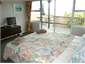 Nicara Cottage main bedroom with door to deck