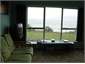 The lounge room showing views to sea