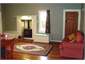 Family room with wood burner & heat pump