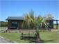 Driveway entry past palm treeree