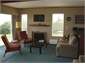 The living room with open fireplace