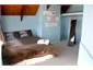 This is a upstairs queen bedroom