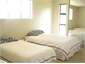 Upstairs bedroom- 1 double & two single beds