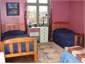 Pink room with 3 singles