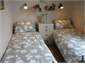 SMALLER TWIN BEDROOM