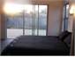 master bedroom looking out onto deck