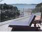 Relax on the deck and enjoy the sea and beach view