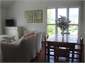 DINING AREA IN OPEN PLAN LIVING ROOM