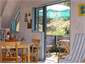 cottage living over deck to garden