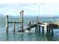 Fun jumping off the wharf at Opononi