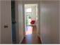 View down hall to main bedroom