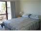 queen bedroom with sea view