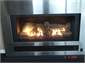 Thermostatic gas fire with remote control