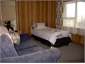 Single bed and roll away