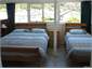 A downstairs bedroom (1 of 5 bedrooms)