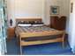 An upstairs bedroom (1 of 5 bedrooms)