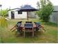 Outdoor furniture on back lawn