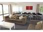 Open plan living upstairs with huge dining table