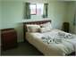 Bedroom 2 - Queen w ensuite shower & 1/2 bath