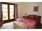 Bedroom 4 with French Doors to the deck.