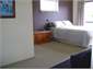 Upstairs bedroom showing end of divan