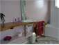  bathroom with bath, shower, toilet, washing mach 
