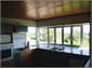 Kitchen has plenty of cabinets,countertops & views