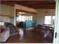 Living open to dining and kitchen